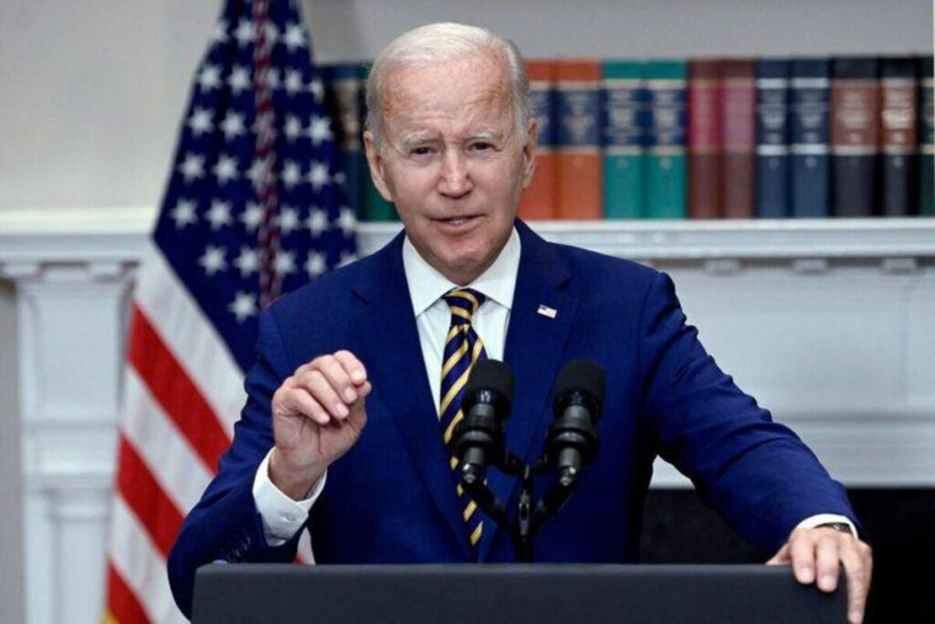 A picture of President Joe Biden talking about lower prices