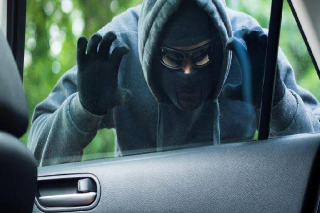 A picture of a carjacking in progress