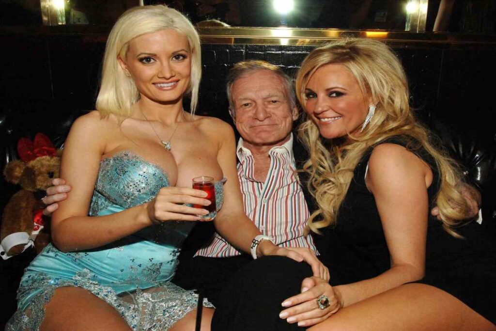 A Picture of Holly Madison, Hugh Hefner, and a Woman