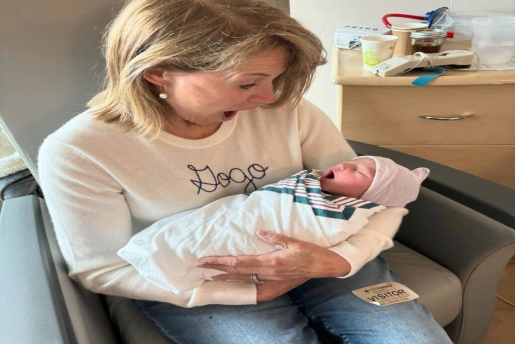 A picture of Katie Couric and her grandchild