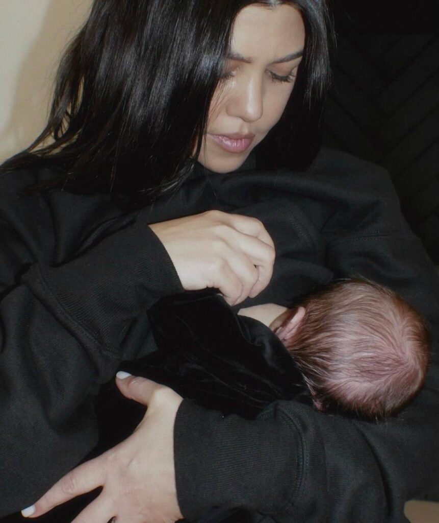 A picture of Kourtney Kardashian and child