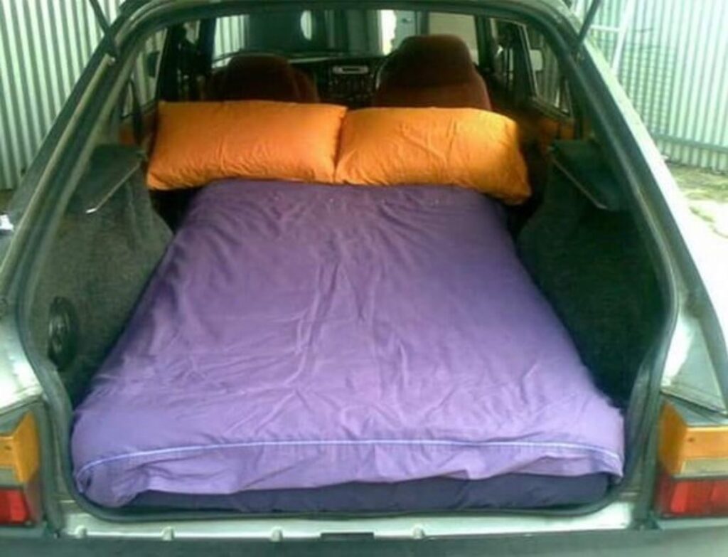 A Picture of a Bed in a Car