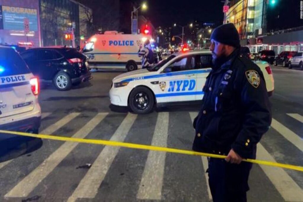 A picture of a NYC police officer on a crime scene