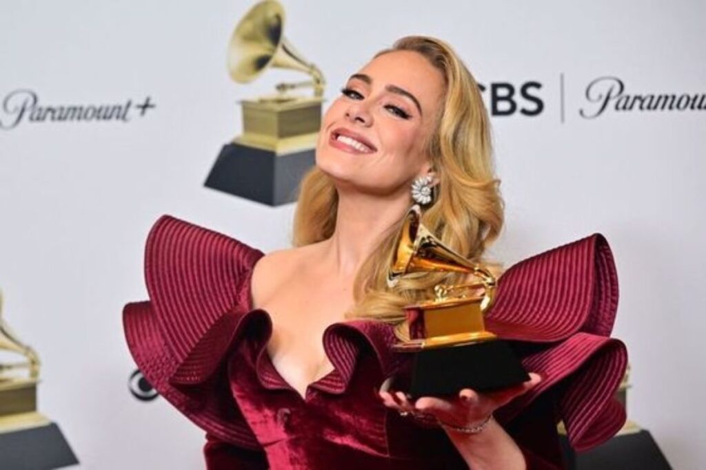 A picture of Adele with her Grammy award