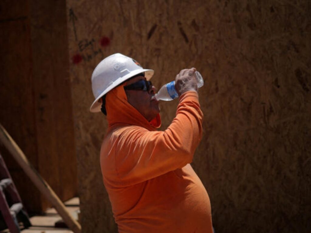 A Picture of a Worker Drinking Water