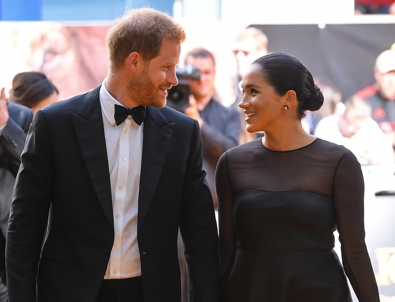 Harry and Meghan looking into each other's eyes