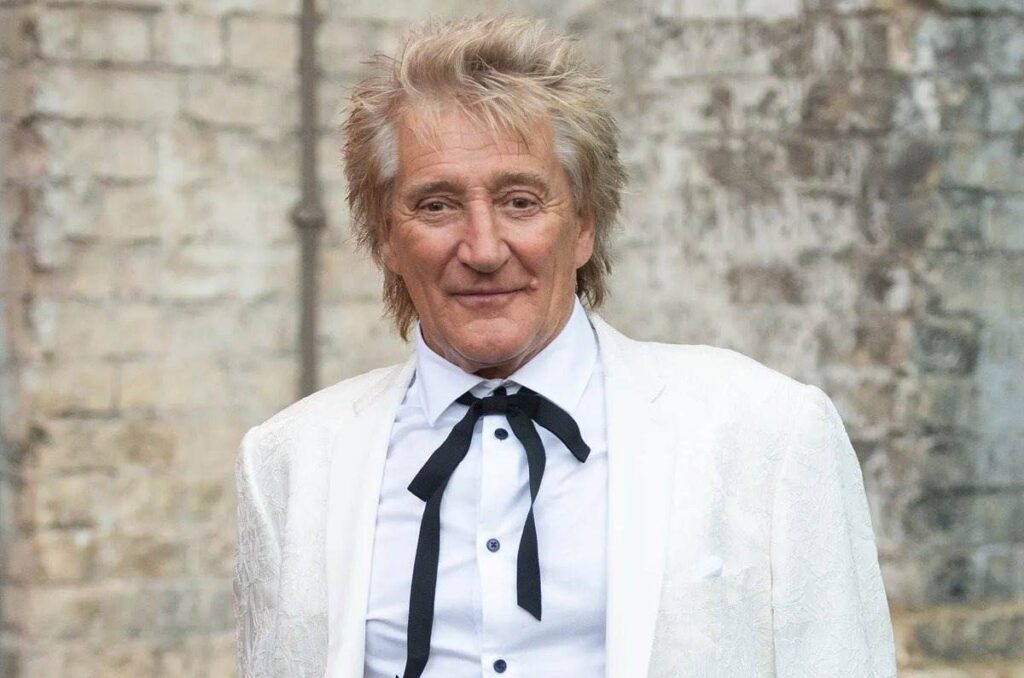 Rod Stewart in a white suit