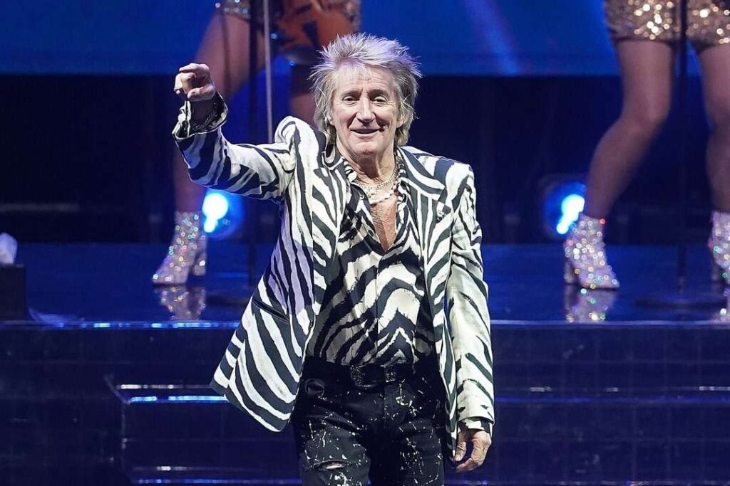 Rod Stewart performing on stage