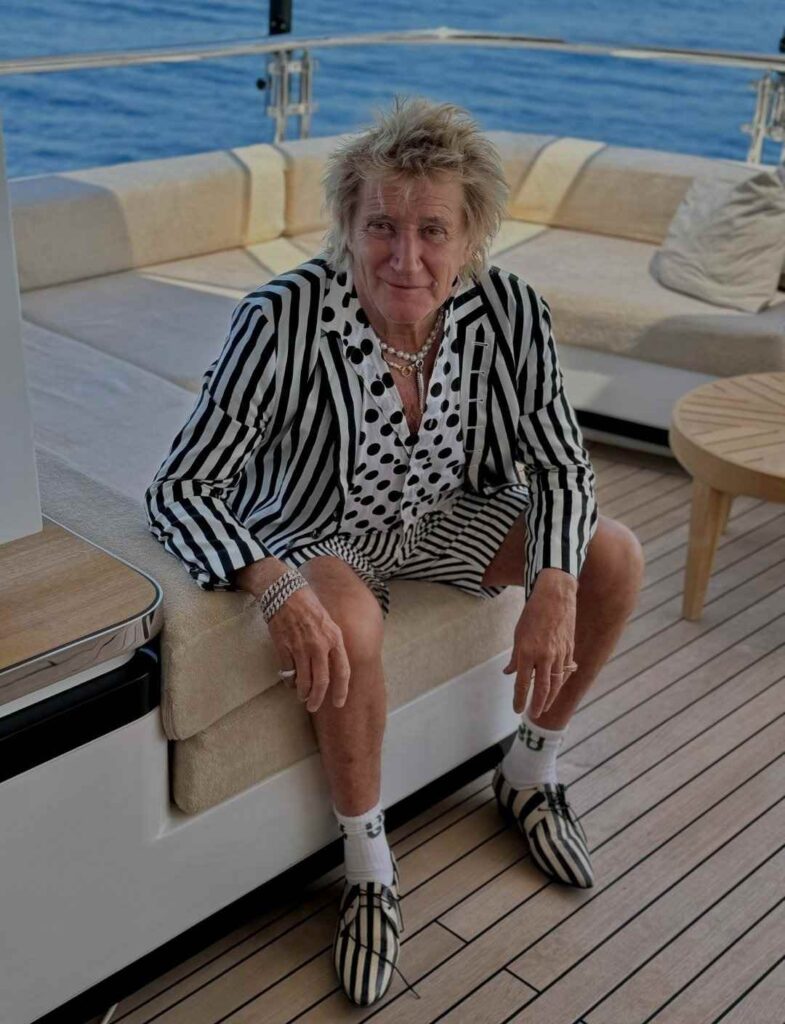 Rod Stewart in matching top and shorts