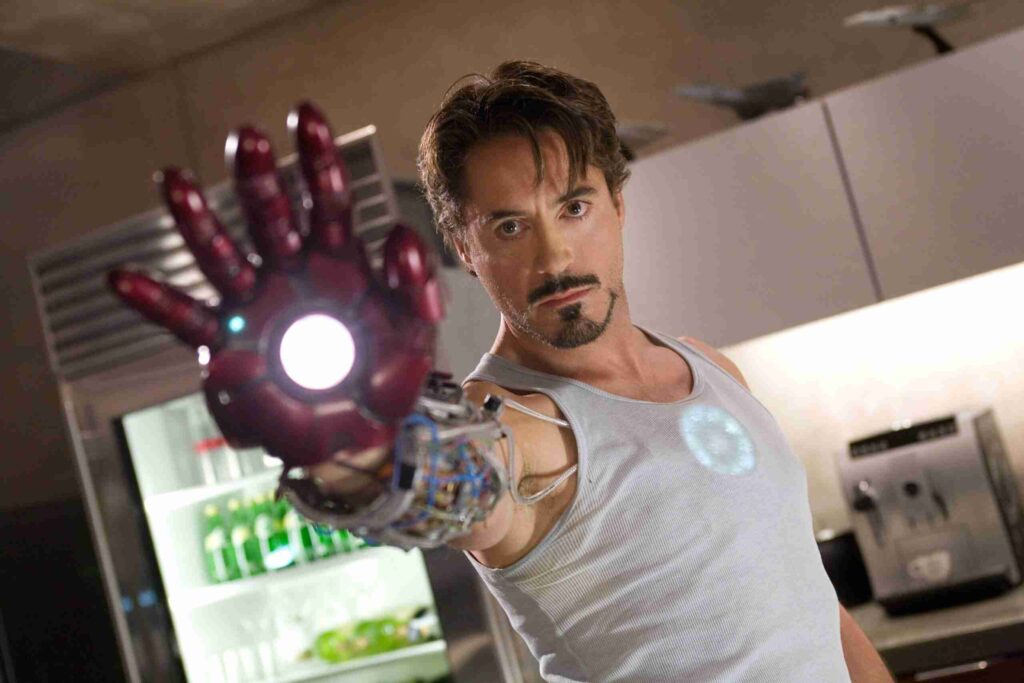 Downey Jr with an iron man prop