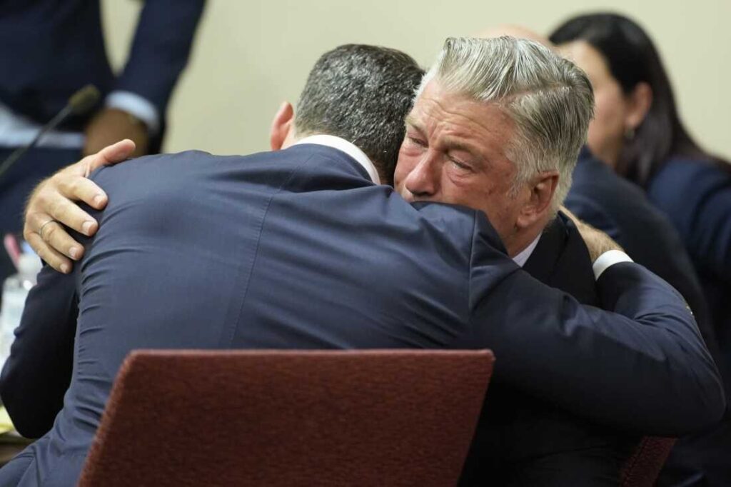 A Picture of Alec Baldwin Hugging Someone in the Courtroom