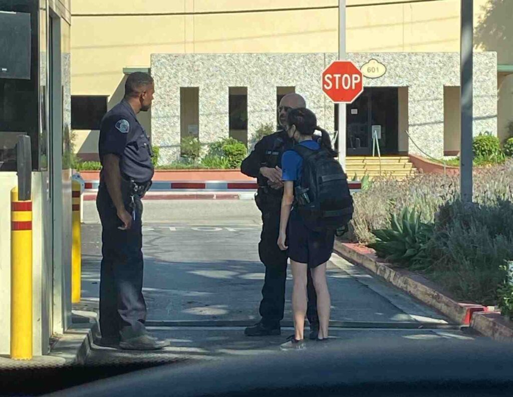 A Picture of Alison Chao and Police Officials