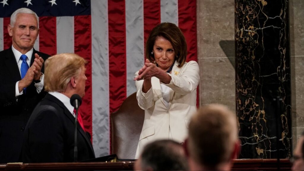 Pelosi clapping for Trump with a mocking face