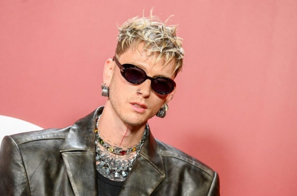 A bust shot of Machine Gun Kelly