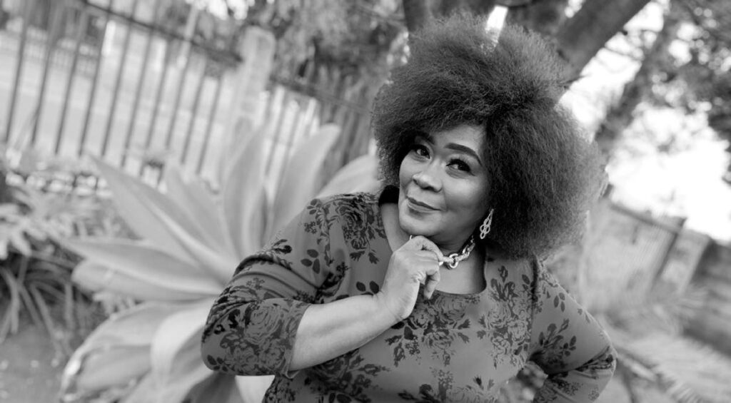 A black and white shot of Connie Chiume