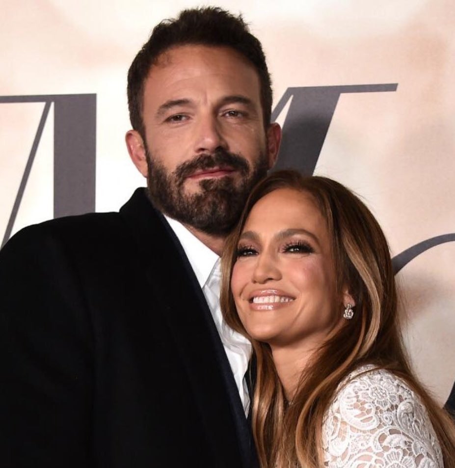 Ben Affleck and Jennifer Lopez posing on the red carpet