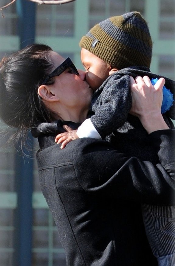 Sandra Bullock with her first child