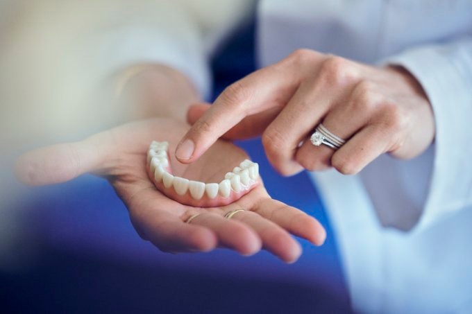 Teeth in the hands of a dentist