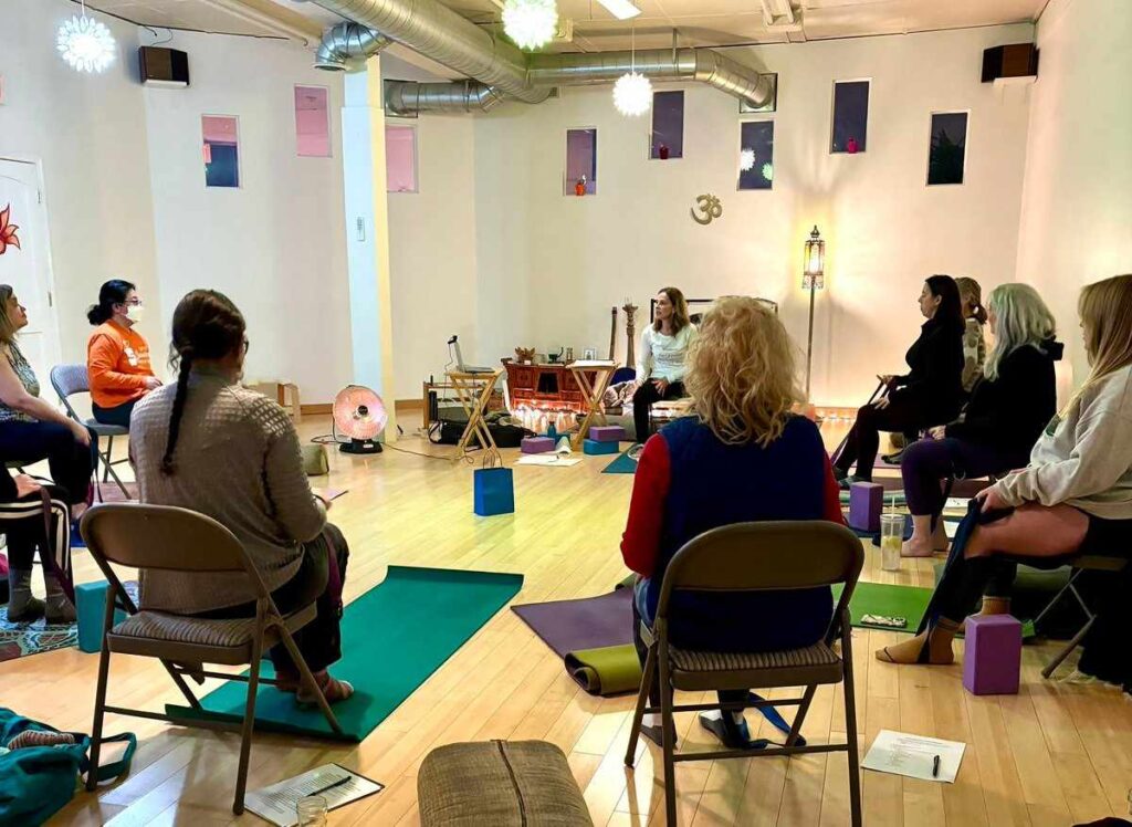 A group of women at a chair yoga session