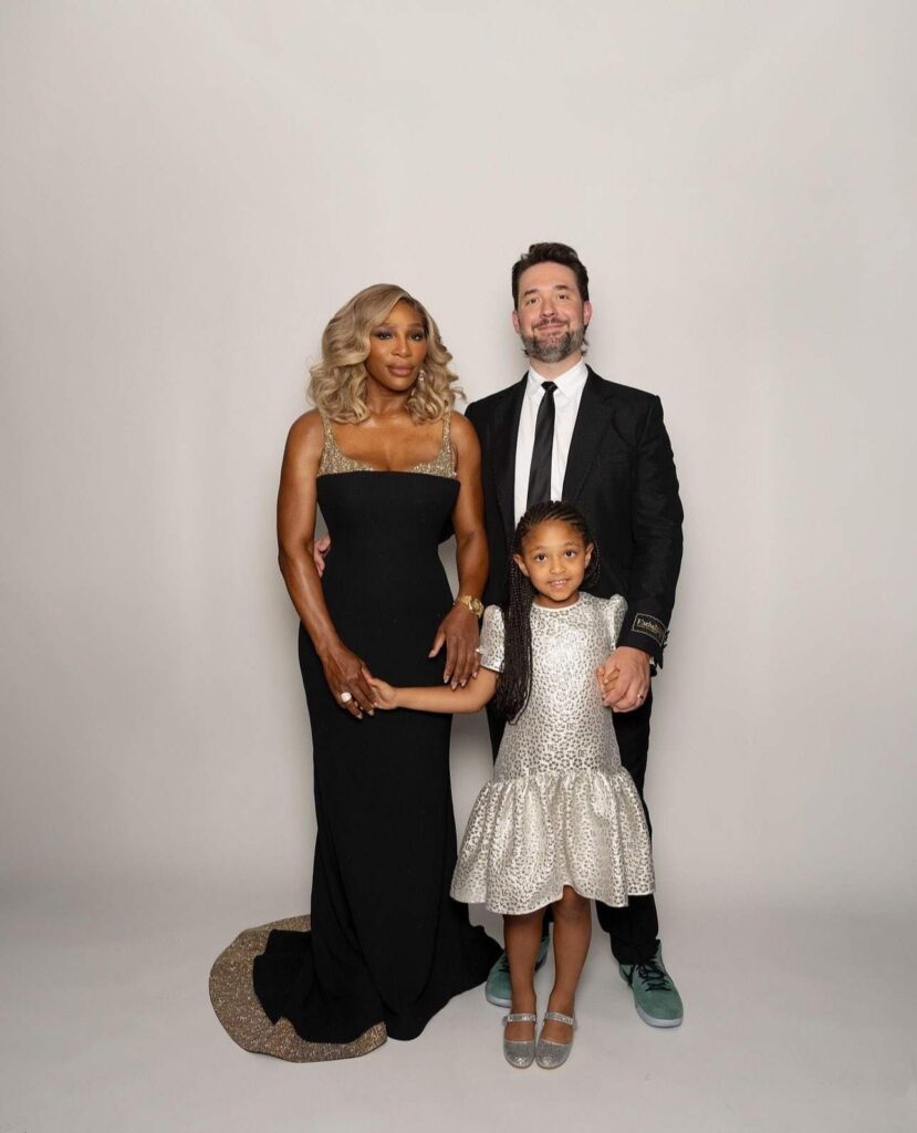 Serena Williams' daughter Olympia posing with her and Ohanian