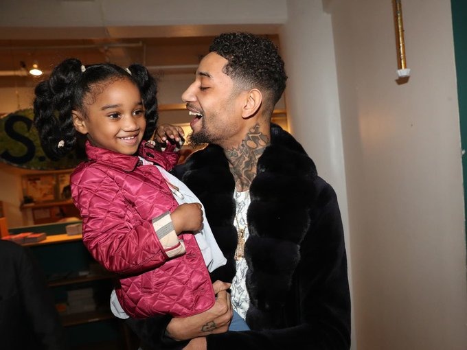 PnB Rock with one of his daughters