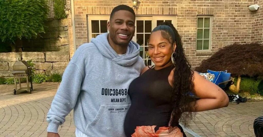 A pregnant Ashanti posing with Nelly