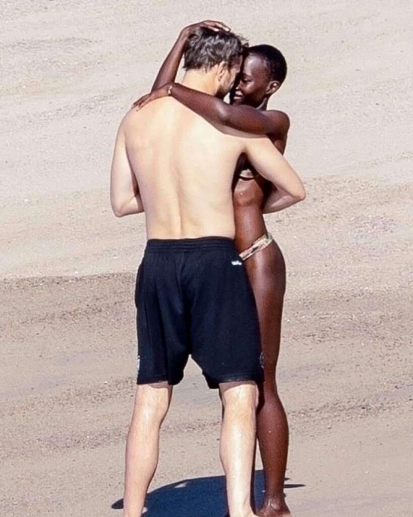 Lupita Nyong'o and Joshua Jackson pouring on the PDA 