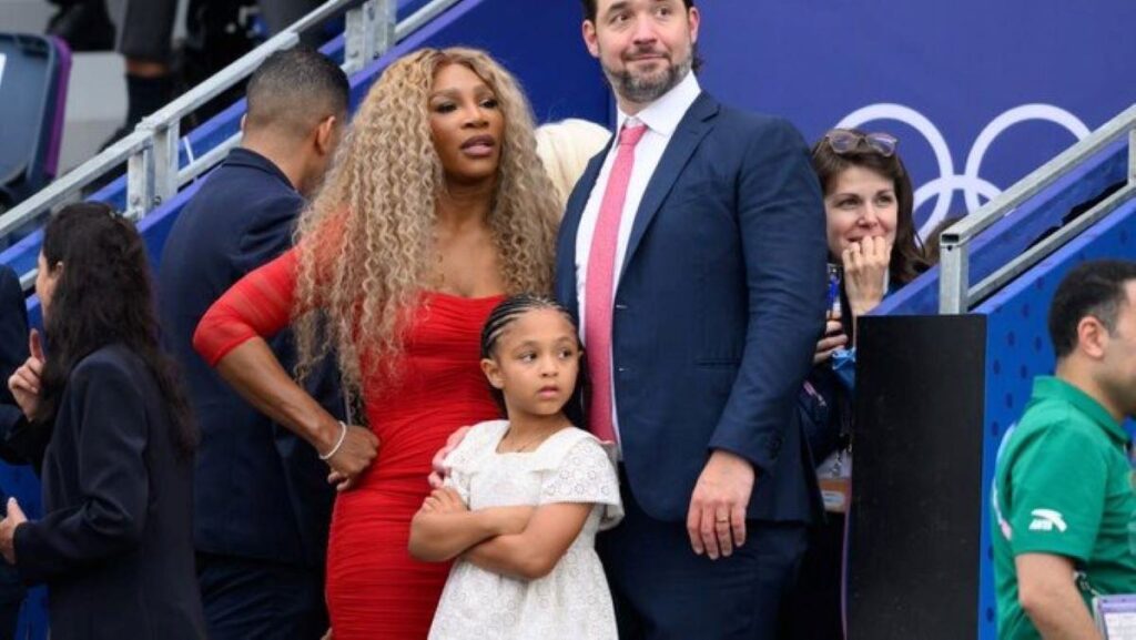 Serena Williams' daughter Olympia posing with her and Ohanian