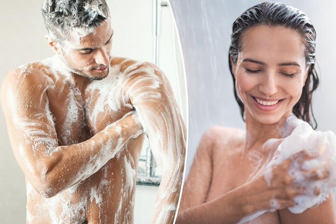 A man and a woman pictured washing up