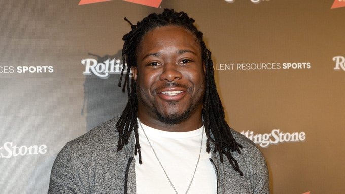 Eddie Lacy posing on a red carpet