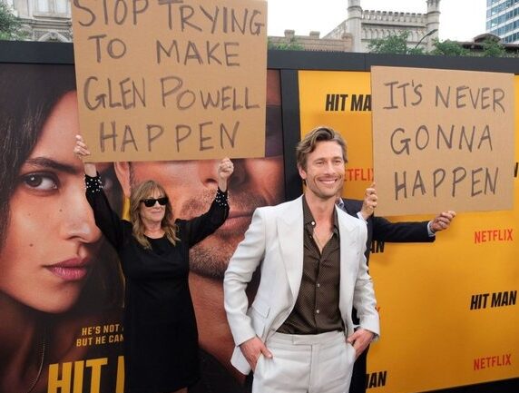 Glen Powell's parents cheering him on and shading at the same time