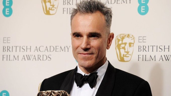 Daniel Day-Lewis posing on a red carpet