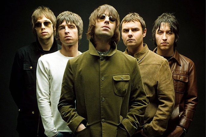 The Oasis band posing for a shot