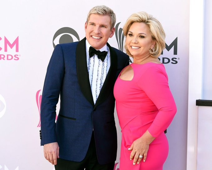 Todd Chrisley posing with his wife Julie