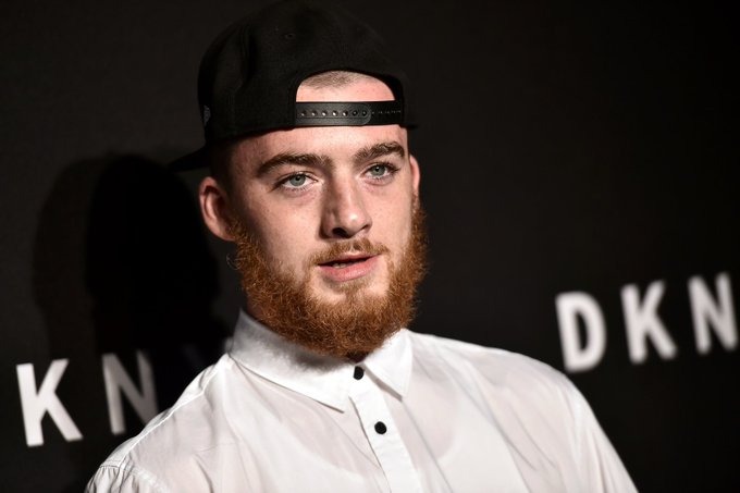 Angus Cloud posing on a red carpet