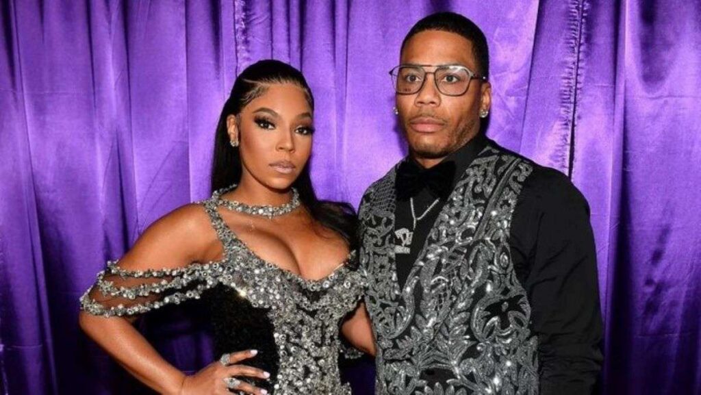 Nelly and Ashanti posing together